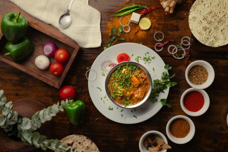 Zucchini-Curry mit Tomaten und Kokosmilch verfeinern