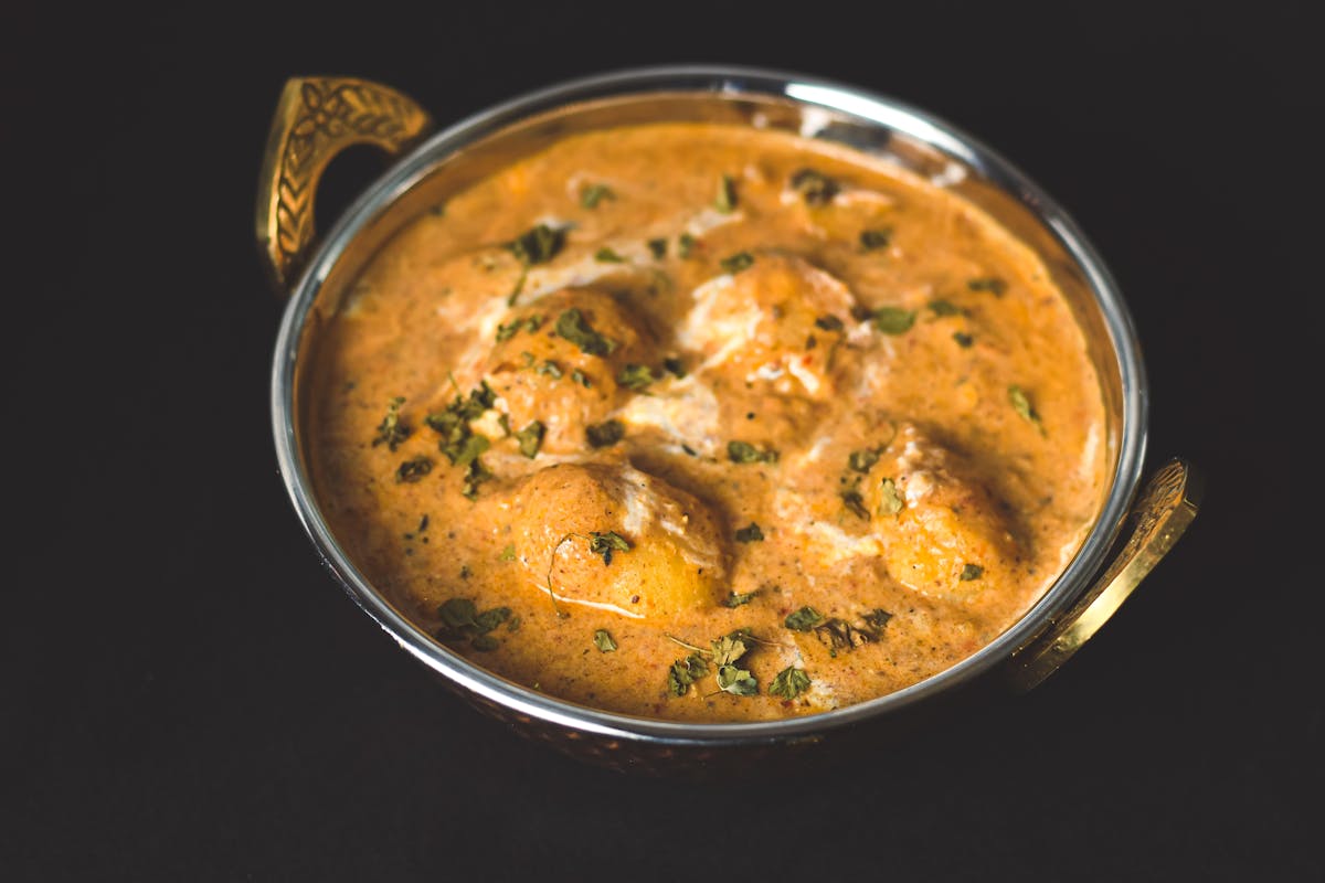 Wie kocht man ein schnelles Suesskartoffel Kokos Curry